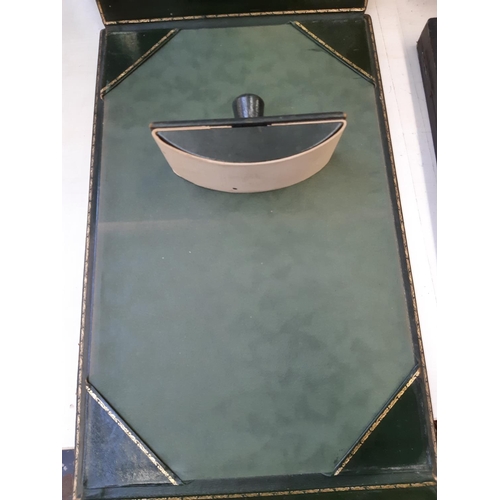 262 - A vintage green leather folding writing pad with matching ink blotter