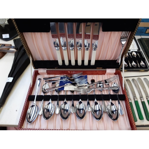 264 - Four cased cutlery sets to include a set of six Angora EPNS teaspoons, green handled butter knives e... 