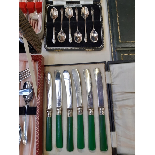 264 - Four cased cutlery sets to include a set of six Angora EPNS teaspoons, green handled butter knives e... 