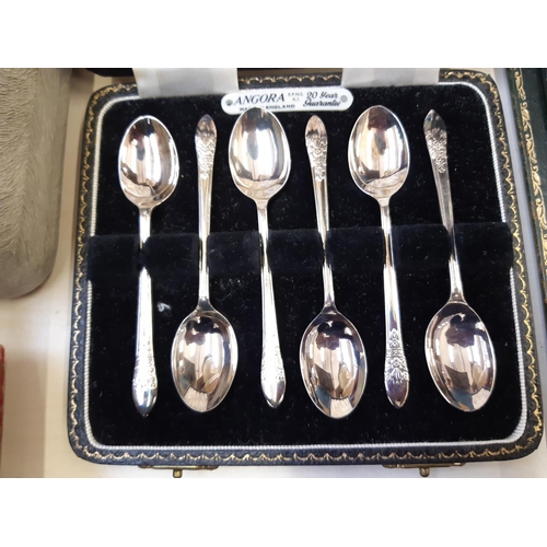 264 - Four cased cutlery sets to include a set of six Angora EPNS teaspoons, green handled butter knives e... 