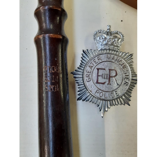 266 - A collection of police ephemera to include a vintage turned wooden truncheon, Cheshire Constabulary ... 