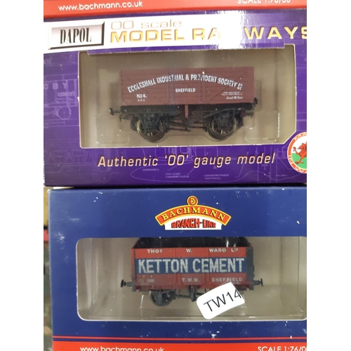 293 - Nine boxed model railway freight wagons to include Bachmann 20 ton brake van, Bachmann 8 plank wagon... 