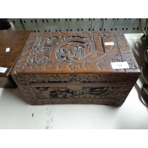 318 - A vintage oriental carved teak box - measuring approx. 30cm wide, 16cm high and 18cm deep