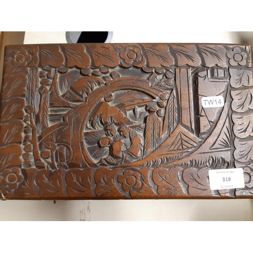 318 - A vintage oriental carved teak box - measuring approx. 30cm wide, 16cm high and 18cm deep