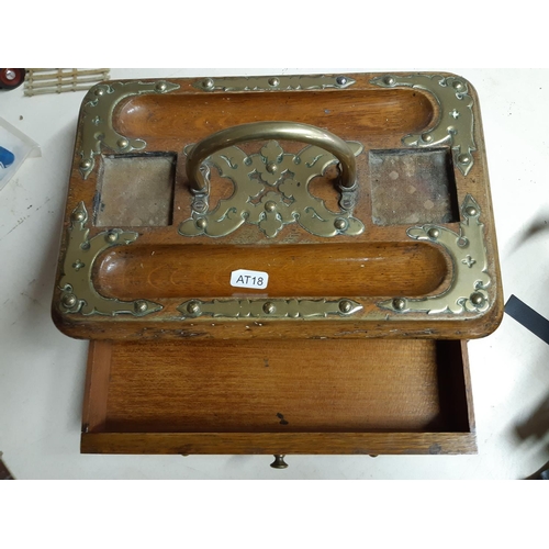 325 - A Victorian oak desk tidy with brass details, one drawer and bun feet - measuring approx. 31cm wide ... 