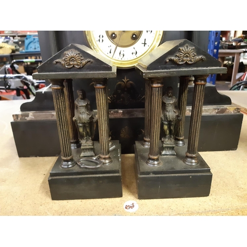 332 - An impressive Victorian slate and marble chiming mantel clock with off white enamel dial, brass beze... 