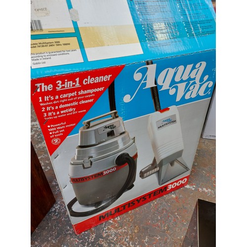 1052 - A boxed Aqua Vac wet and dry vacuum cleaner