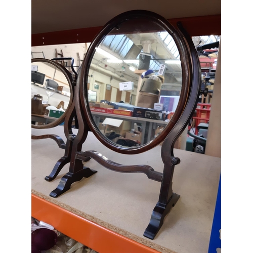 341 - A Georgian inlaid mahogany oval dressing table mirror - measuring approx. 51cm high and 34cm wide (s... 