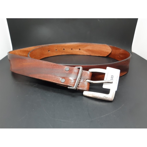 349 - An Italian 7 For All Mankind brown leather men's belt - measuring approx. 105cm (see condition repor... 