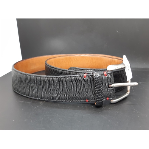 351 - A good quality Italian Billionaire black iguana skin men's belt - measuring approx. 105cm