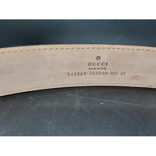 355 - An Italian Gucci black leather men's belt - measuring approx. 105cm