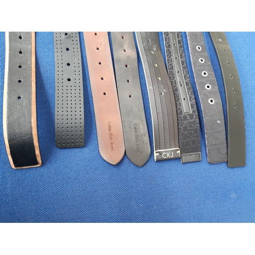 362 - Eight Calvin Klein men's belts to include three black leather, three brown leather and two fabric