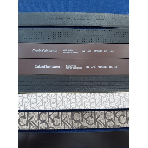 362 - Eight Calvin Klein men's belts to include three black leather, three brown leather and two fabric