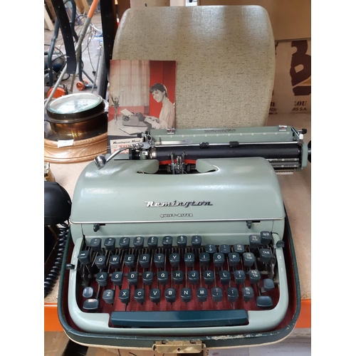 370 - A vintage cased Miracle Tab typewriter