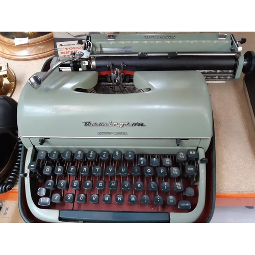 370 - A vintage cased Miracle Tab typewriter