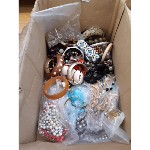 387 - A box containing a large quantity of costume jewellery