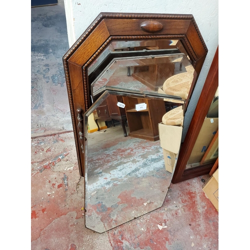 475 - Three vintage mirrors to include two Art Deco bevel edged frameless wall mirrors and a vintage oak f... 