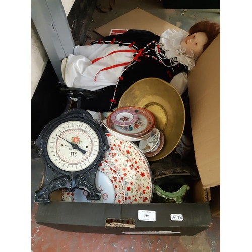 389 - Three boxes containing mixed items to include a set of Victorian style cast metal kitchen scales, la... 