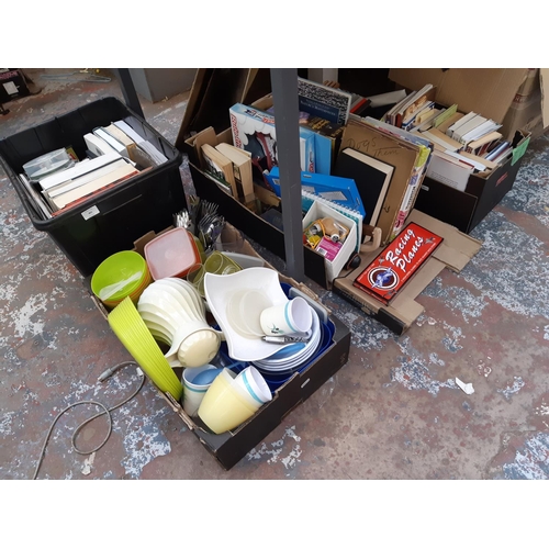 401 - Five boxes containing mixed items to include cutlery, outdoor tableware, various books, DVDs, boxed ... 