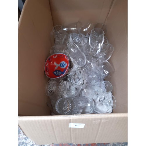 411 - A box containing a large quantity of glassware to include wineglasses, cut crystal tumblers, tankard... 