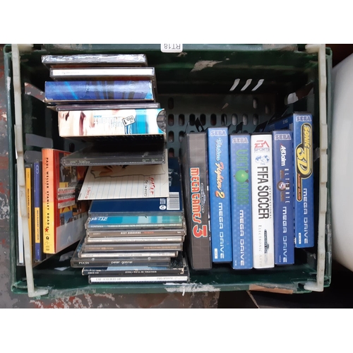 416 - A box containing various CDs and six Sega Megadrive games together with Meaco dehumidifier