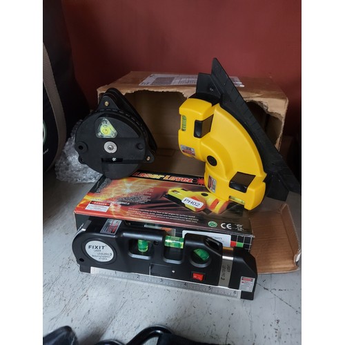 753A - Two new items to include laser level kit and spirit level tape measure