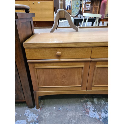 539 - A Stateroom by Stonehill teak sideboard with three drawers and three lower doors - measuring approx.... 