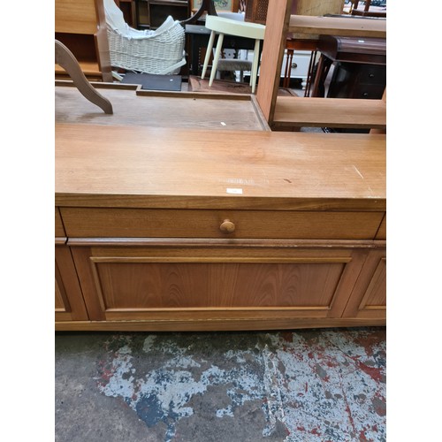 539 - A Stateroom by Stonehill teak sideboard with three drawers and three lower doors - measuring approx.... 