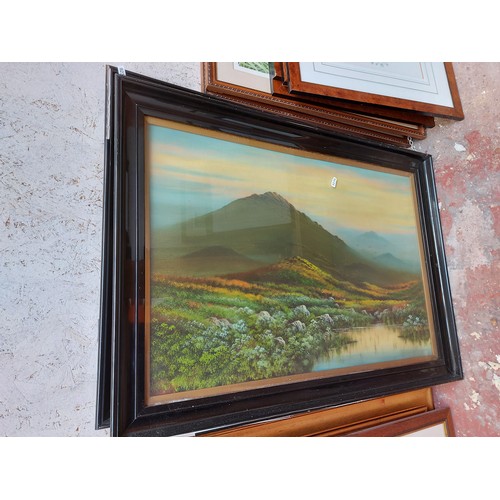 480 - A pair of Victorian ebony framed oil paintings of mountain and lake scenes - each measuring approx. ... 