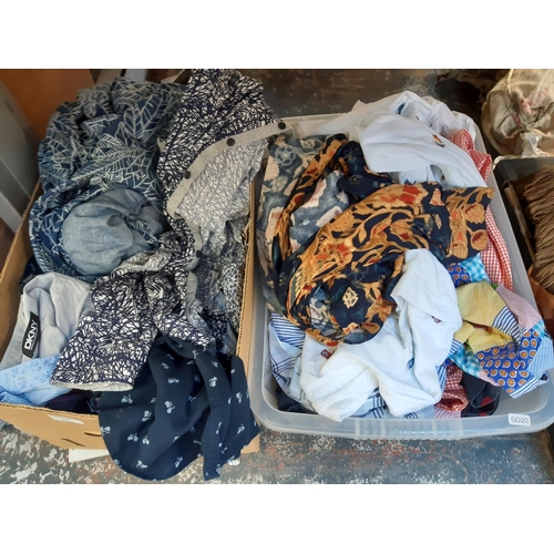 427 - Two boxes containing a large quantity of men's shirts ranging from XL to XXL to include Polo Ralph L... 