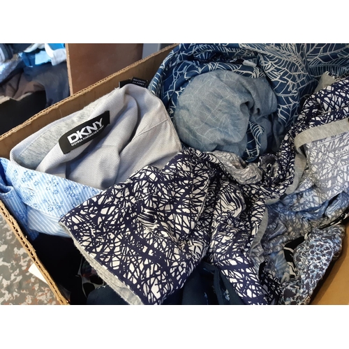 427 - Two boxes containing a large quantity of men's shirts ranging from XL to XXL to include Polo Ralph L... 