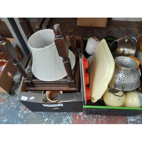 434 - Two boxes containing mixed items to include an oak stool, kitchenware, china, glassware etc.