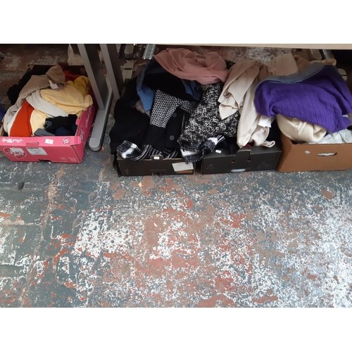 446 - Four boxes containing a large quantity of good quality men's jumpers ranging from size XL to XXL to ... 