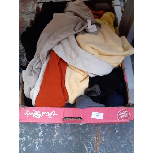 446 - Four boxes containing a large quantity of good quality men's jumpers ranging from size XL to XXL to ... 