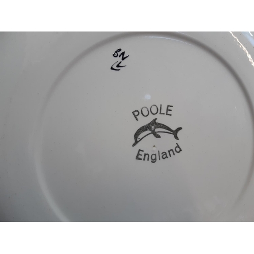 451 - Three items to include a Poole pottery plate (25.5cm), Bwthyn pottery of Barmouth Wales studio mottl... 