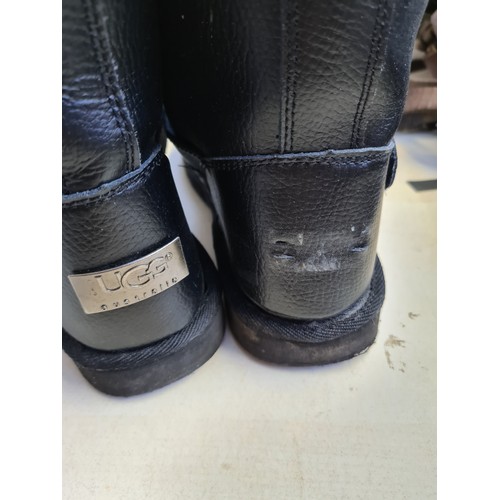 297A - A pair of genuine UGG black leather boots - size 6.5 (see condition report)