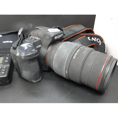 388F - Two items to include a Sony DSLR-A300 digital camera with Sigma AP0 DG 70-300mm lens and a Traveller... 