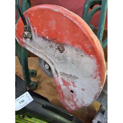 735 - An orange and white Stihl TS400 petrol disc cutter