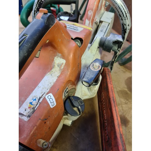 735 - An orange and white Stihl TS400 petrol disc cutter