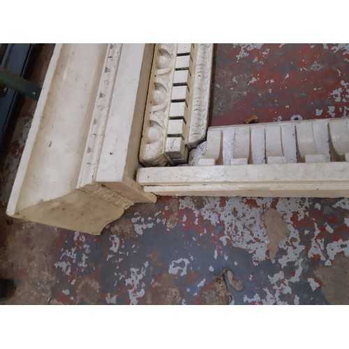 772 - A white painted vintage wooden ornate mantelpiece measuring approx. 172cm wide and 94 1/2cm high