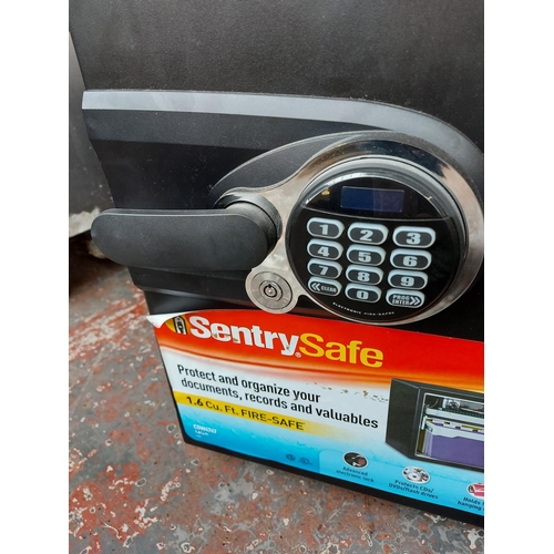 745 - A black Sentry Safe 1.6 Cubic Ft fire safe