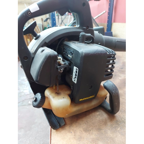 773 - A black and yellow Mcculloch Mac 320BV petrol leaf blower