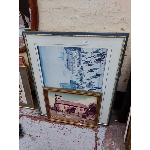 430 - Two framed prints to include L.S. Lowry 'Going to the match 1953' and a church scene