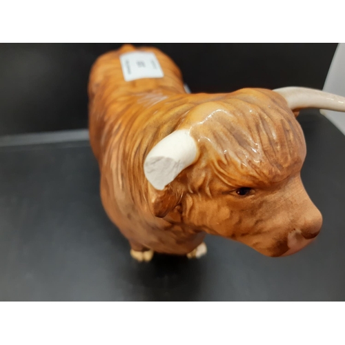 103 - A Beswick highland bull figurine - model no. 2008 (see condition report)