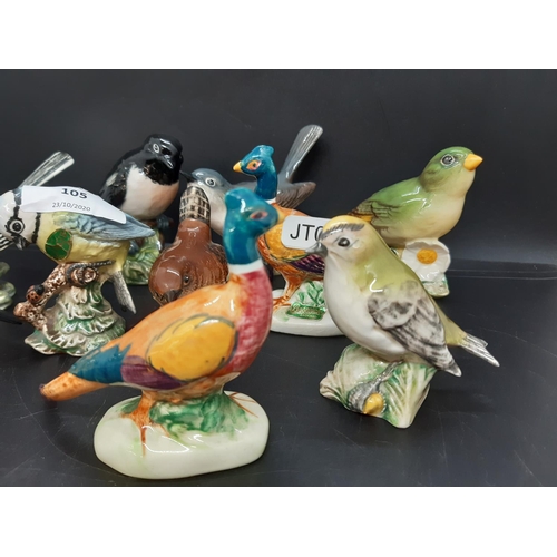 105 - Ten Beswick bird figurines to include wren - model no. 993, stonechat - model no. 2274, blue tit - m... 