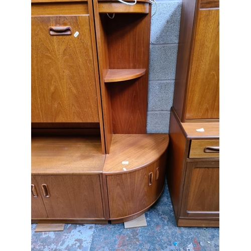 461 - A 1970s G Plan Fresco teak three piece living room suite comprising corner cabinet with two lower cu... 