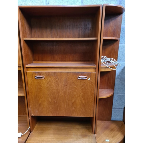 461 - A 1970s G Plan Fresco teak three piece living room suite comprising corner cabinet with two lower cu... 