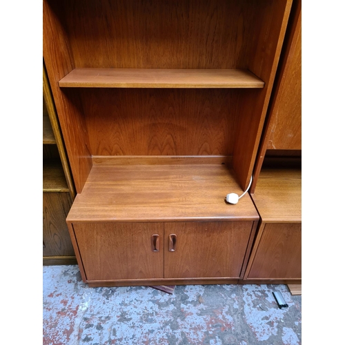 461 - A 1970s G Plan Fresco teak three piece living room suite comprising corner cabinet with two lower cu... 