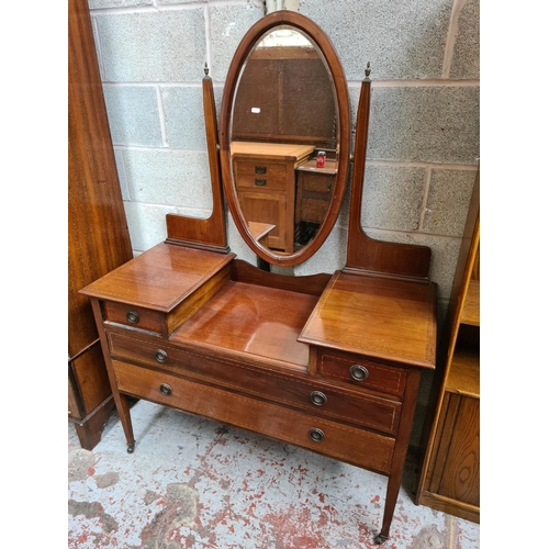 463 - An Edwardian inlaid mahogany four piece bedroom suite comprising dressing table with oval bevel edge... 