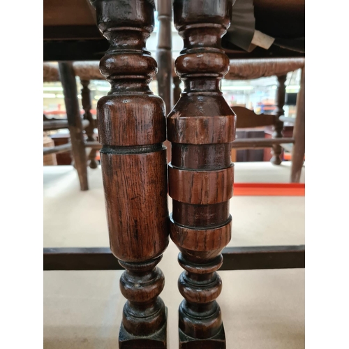 475 - Two vintage oak carver dining chairs with brown leatherette upholstery